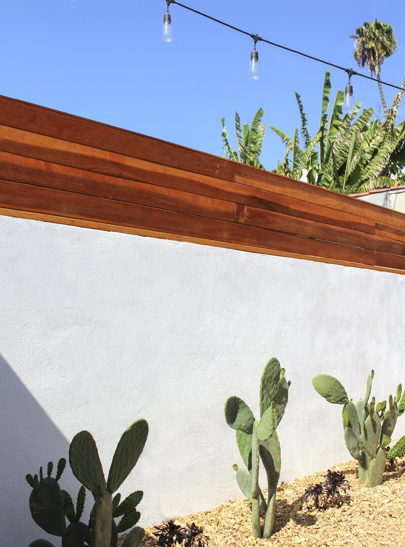 Concrete wall with redwood trim